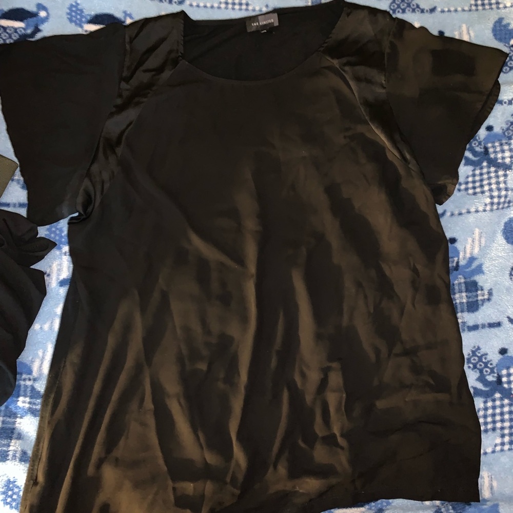 the limited black shirt